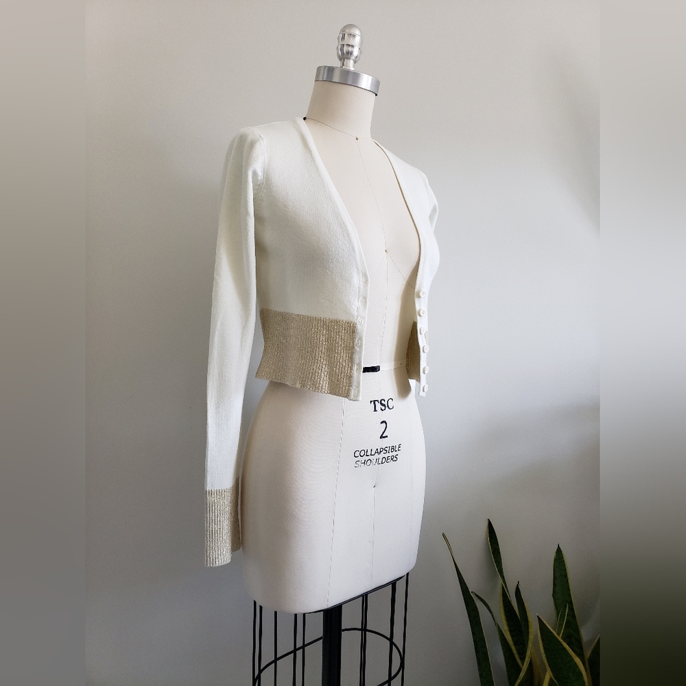 Y2K cropped cardigan with wide metallic gold ribbed cuffs and hem